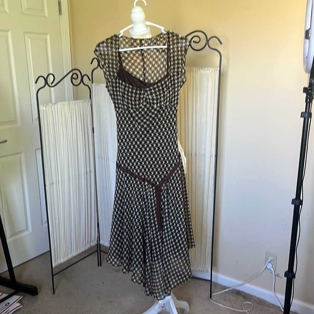 Brown herringbone print dress.